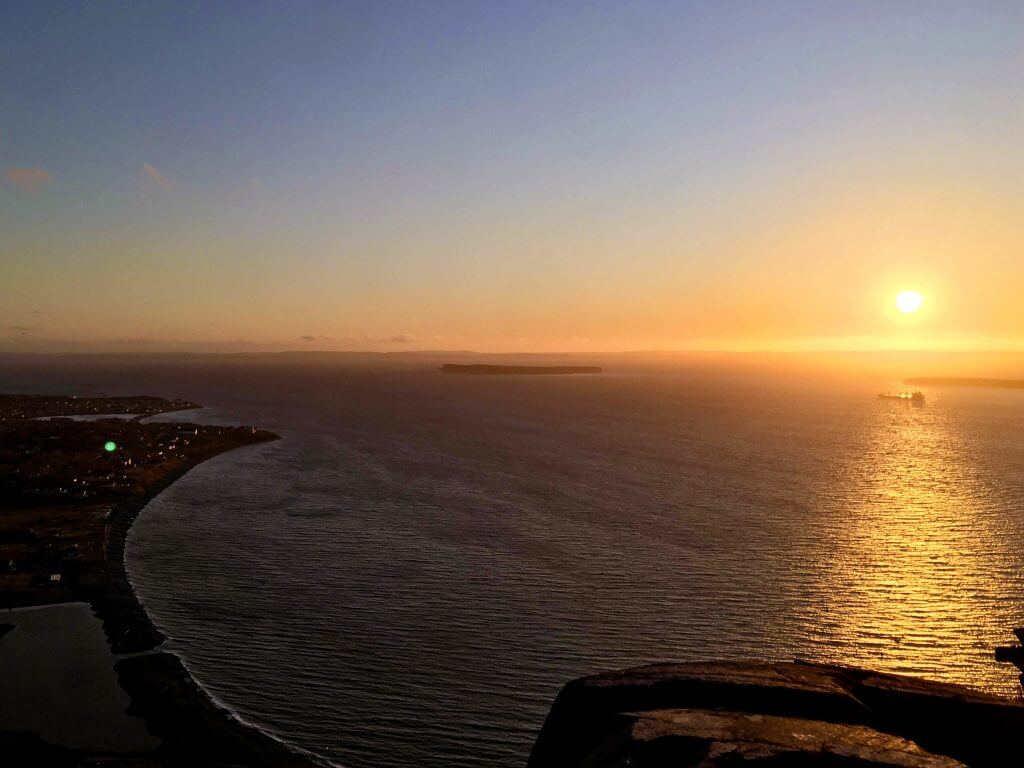A gorgeous sunset shot out over the ocean at Topsail Bluff.
